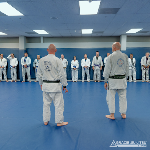 Students training Brazilian Jiu Jitsu on the mat at Gracie Martial Arts in Stuart, FL