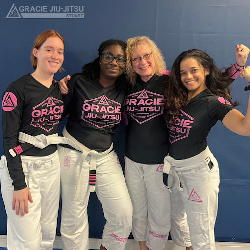 Women practicing self-defense techniques